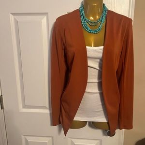 Auburn orange blazer with turquoise necklace